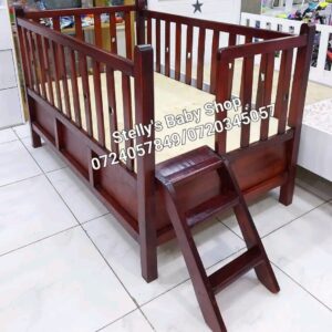 3.5 by 5 ft brown bed